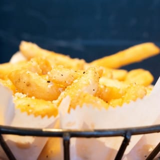Basket of Pepper Parmesan Fries (d)