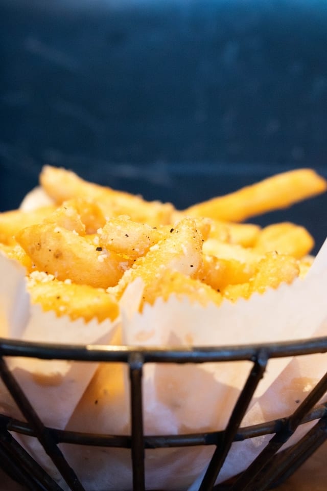 Basket of Pepper Parmesan Fries (d).